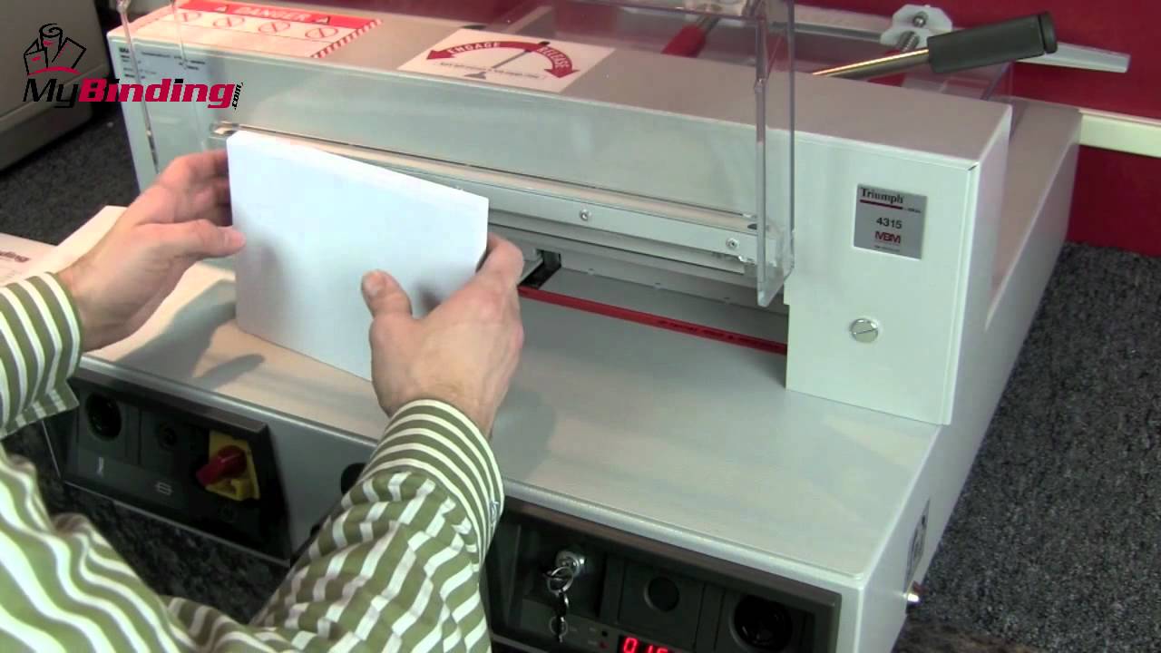 paper slicer with rotating page measurer paper slicer with rotating page measurer