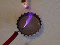 Title:High Voltage Rum Description:High voltage (~25kV) from a computer monitor flyback transformer applied to a capful of Sailor Jerry rum.
