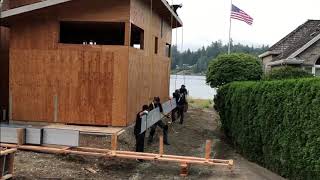 How do they get that material up on a roof?