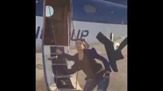Nina Dobrev Trips & Falls As She Exits Private Plane Video