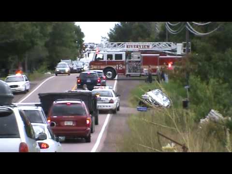The woman fell asleep while driving the mini van, crossed over going into the ditch and hitting a