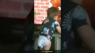 Cheeky Baby Tries To Take His Diaper Off 