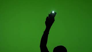 Cell Phone Light In Concert, Green Screen Hand Up Phone 4K [Free Download]