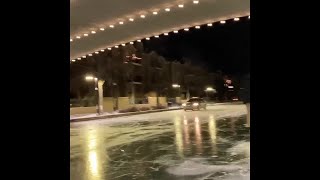 New : Close-up of car driving on frozen Indy canal