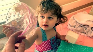 Baby Ayla unboxes her Yume Twins box and gets a funny hat!