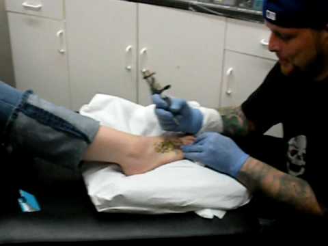Star tattoo on foot