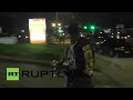 USA: Store fronts smashed as looting sets in during Ferguson protest