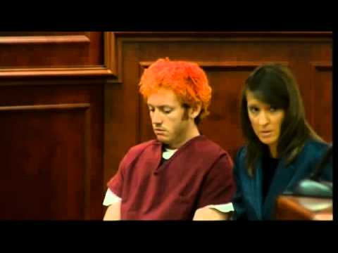 Colorado massacre suspect looks dazed in first court hearing ...