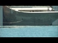 Costa Concordia wreck docks in Genoa klip izle