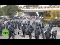 Mexico Violence: Protesters armed with bats, metal pipes & machetes clash with riot police