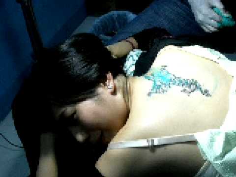 getting her ink in morbid tattoo in cash and carry mall makati manila 