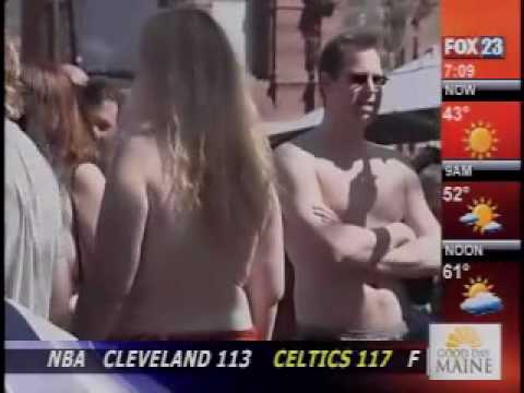 Girls walk topless through Portland Maine USA in protest