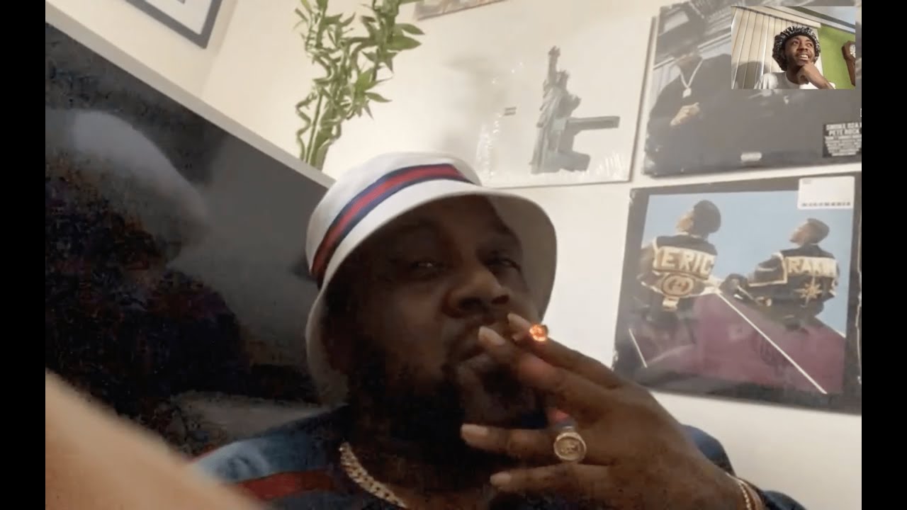 Sean Kingston smoking a cigarette (or weed)
