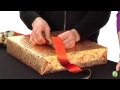 How to tie a ribbon onto a gift box