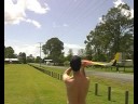 Balsa wood glider crashes through cement tile roof! Glider 1, cement roof 0.