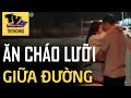 Đôi nam nữ dừng xe, vô tư hôn nhau giữa đường ở Sài Gòn