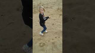Little Girl Doing Somersault And Split Gymnastics
