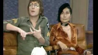 Watch John Lennon Revolution video