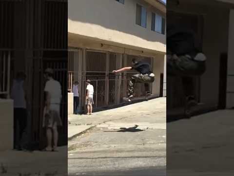 Hill bomb to big street gap Ollie in Los Angeles