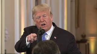 Trump clashes with media at heated news conference