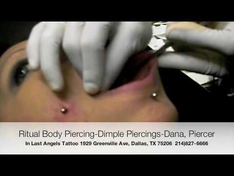 Dana-Performing some cheek piercings..Come by and visit!!Open Mon.Tues.Wed.Thu.3-10pm, Fri.Sat 3-1am, Sun2-8pm.