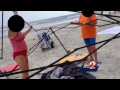 Women caught on video stealing beach equipment from family