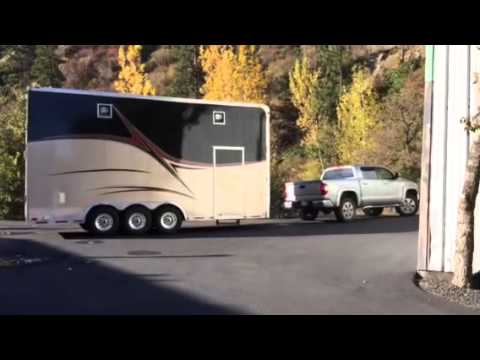 Tundra pulling double stacker trailer - YouTube