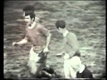 After falling behind, goals from Peter Noble, Arthur Horsfield and John Trollope see Swindon through to the FA Cup Quarter Finals on the County Ground quagmire.