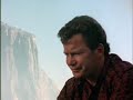 Captain Kirk is climbing a mountain, why is he climbing a mountain?