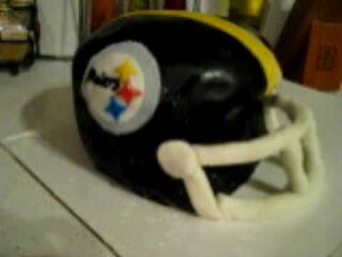 This is a football helmet for the Pittsburg Steelers. This cake was made for 