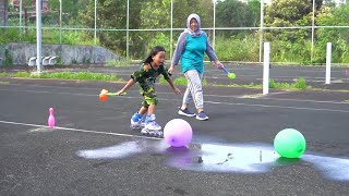 Bermain Sepatu Roda Dan Meletuskan Balon Isi Air