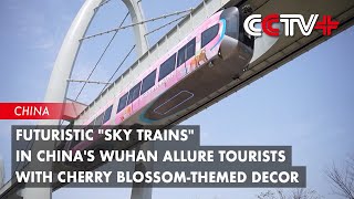 Futuristic Sky Trains In Chinas Wuhan Allure Tourists With Cherry Blossom-Themed Decor