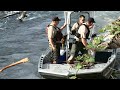 Sheriff's Office, Bill Erickson Heavy Construction remove hazardous log from Clackamas River