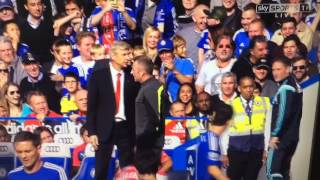 Arsene wenger pushes Jose mourinho