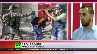 Israeli police beat & pepper spray Palestinian journalists
