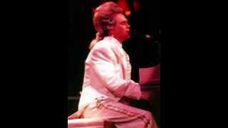 Watch Elton John Cold As Christmas In The Middle Of The Year video