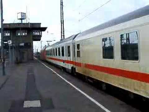 an ICE train leaving the ice trains in germany. an ICE train leaving the