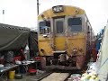 Train Runs Through Maeklong Market