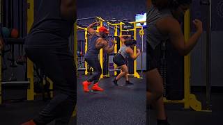 Father And Daughter Posing Routine In The Gym.