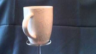 Werbeartikel, Tasse, bedruckt mit Reliefdruck bzw. Reliefprint in Struktur und Logo