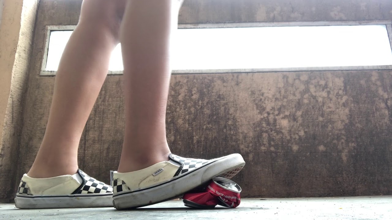 Girl crushing crickets trainers