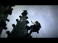 Voltigeurs du Ciel : alpinistes au travail à 65 mètres au-dessus de la Grotte de Lourdes (France)