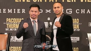 MANNY PACQUIAO SIZES UP KEITH THURMAN DURING FACE TO FACE IN LOS ANGELES