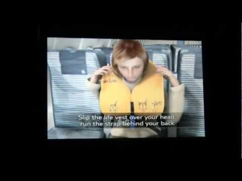 ArkeFly Safety Instructions Boeing 737800 PHTFD sky Interior