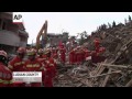 Rescue Workers Dig Through China Quake Debris