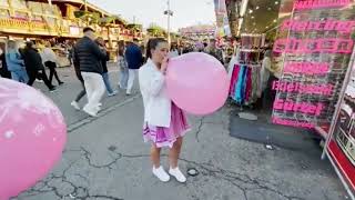 Cute Girls Blowing And Have Fun And Popping Big Ballons