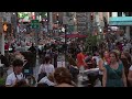 Long shot of crowds at Times Square New York.