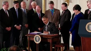 Obama Signs Bills that Modernize U.S. Trade Policy