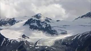 Watch John Denver Wrangle Mountain Song video