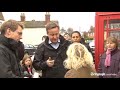 David Cameron confronted by angry resident in flood-hit village